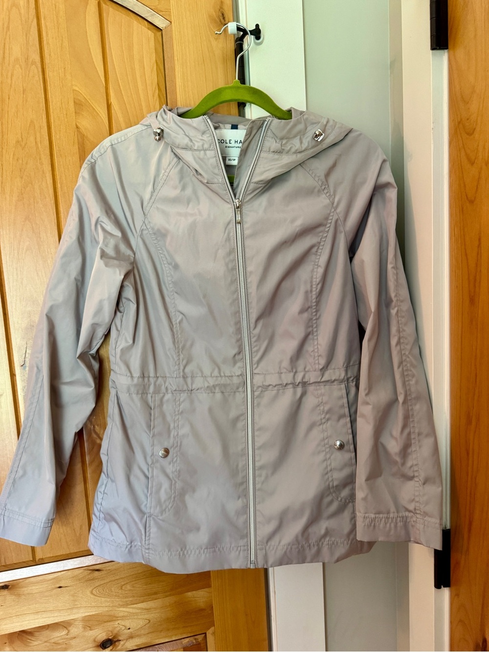 NWOT Cole Haan Packable short rain jacket with hood.